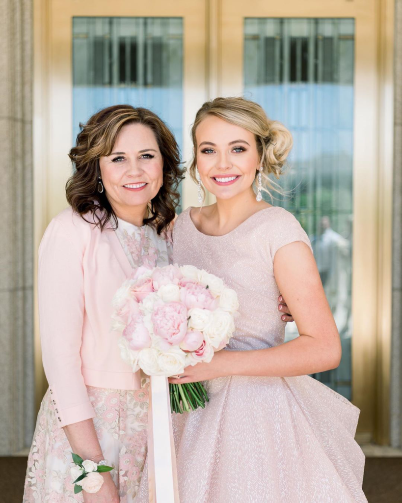 Our Bitsy Bride and her mom on her big day,wearing custom modest build up by Bitsy Bridal